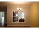 Dining room features hardwood floors and large window at 95 Twin Lakes Dr, Carrollton, GA 30116