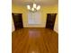 Bright dining room featuring hardwood floors and built-in hutch at 95 Twin Lakes Dr, Carrollton, GA 30116