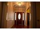 Bright entryway with hardwood floors and a decorative door at 95 Twin Lakes Dr, Carrollton, GA 30116