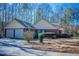 Brick house with attached two-car garage at 95 Twin Lakes Dr, Carrollton, GA 30116