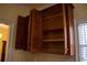 Well-maintained wooden kitchen cabinets offer ample storage space at 95 Twin Lakes Dr, Carrollton, GA 30116