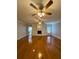 Spacious living room with hardwood floors, built-in shelving, and fireplace at 95 Twin Lakes Dr, Carrollton, GA 30116