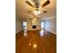 Spacious living room with hardwood floors, built-in shelving, and fireplace at 95 Twin Lakes Dr, Carrollton, GA 30116