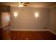 Bright living room with hardwood floors and neutral walls at 95 Twin Lakes Dr, Carrollton, GA 30116