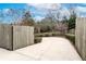 Driveway entrance with wooden gates at 2108 Kendall Close Nw, Acworth, GA 30102