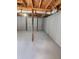 Unfinished basement with high ceilings and ample storage space at 6467 Joanna St, Lithia Springs, GA 30122