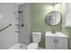 This bathroom features a walk in shower, toilet and vanity sink at 6467 Joanna St, Lithia Springs, GA 30122