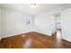 Bedroom with hardwood floors and large window at 6467 Joanna St, Lithia Springs, GA 30122