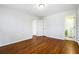 Hardwood floor bedroom with access to en-suite bathroom at 6467 Joanna St, Lithia Springs, GA 30122