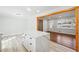 The spacious kitchen features a large island with quartz countertops and white cabinetry at 6467 Joanna St, Lithia Springs, GA 30122
