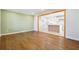 Open living room with view into updated kitchen at 6467 Joanna St, Lithia Springs, GA 30122
