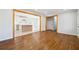 Hardwood floors and an open concept design connect the living room to the kitchen at 6467 Joanna St, Lithia Springs, GA 30122