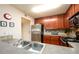 Kitchen with stainless steel appliances and wood cabinets at 3650 Ashford Dunwoody Ne Rd # 514, Atlanta, GA 30319