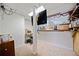 Basement wet bar with a TV and shelving at 1956 Spencer Oaks Ln, Lithonia, GA 30058