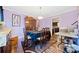 Dining area with wood flooring and a table for six at 1956 Spencer Oaks Ln, Lithonia, GA 30058