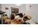 Home office features a large desk and built-in shelving at 1956 Spencer Oaks Ln, Lithonia, GA 30058