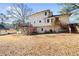 Two-story house with large deck and expansive backyard at 1956 Spencer Oaks Ln, Lithonia, GA 30058