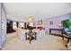 Living room with neutral colored furniture and fireplace at 1956 Spencer Oaks Ln, Lithonia, GA 30058