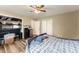 Bedroom with a full-size bed, closet, and water cooler at 3570 Knoll Crest Trl, Buford, GA 30519