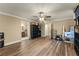 Spacious bedroom featuring wood floors and neutral walls at 3570 Knoll Crest Trl, Buford, GA 30519