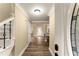 Bright entryway with hardwood floors and staircase at 3570 Knoll Crest Trl, Buford, GA 30519