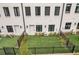 Aerial view of townhomes with fenced-in backyards at 1107 Briar Cove Cir, Atlanta, GA 30329