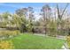 Artificial turf backyard with a view of trees at 1107 Briar Cove Cir, Atlanta, GA 30329