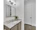 Contemporary bathroom with marble vanity and large mirror at 1107 Briar Cove Cir, Atlanta, GA 30329