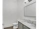 Elegant bathroom with marble countertop and gray cabinets at 1107 Briar Cove Cir, Atlanta, GA 30329