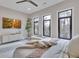 Main bedroom featuring a large TV and ample natural light at 1107 Briar Cove Cir, Atlanta, GA 30329