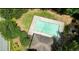 Aerial view featuring a community swimming pool, providing a refreshing amenity for residents at 11118 Benton Woods Dr, Covington, GA 30014