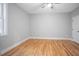 Bright bedroom with hardwood floors and ceiling fan at 2195 Springdale Sw Rd, Atlanta, GA 30315