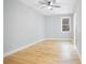 Bright bedroom with hardwood floors and ceiling fan at 2195 Springdale Sw Rd, Atlanta, GA 30315