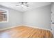 Spacious bedroom with hardwood floors and ceiling fan at 2195 Springdale Sw Rd, Atlanta, GA 30315