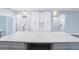 Large kitchen island with white quartz countertop, offering ample prep space at 2195 Springdale Sw Rd, Atlanta, GA 30315