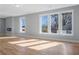 Bright living room with hardwood floors and large windows at 2195 Springdale Sw Rd, Atlanta, GA 30315