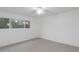 Well-lit bedroom, featuring tile flooring and a ceiling fan at 3242 Henderson Mill Rd # 3, Atlanta, GA 30341