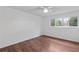 Spacious bedroom with hardwood floors and a large window at 3242 Henderson Mill Rd # 3, Atlanta, GA 30341