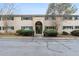 Attractive brick building with green shutters, a front door, and well-kept landscaping at 3242 Henderson Mill Rd # 3, Atlanta, GA 30341