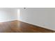 Hardwood floors and ample natural light in this living room at 3242 Henderson Mill Rd # 3, Atlanta, GA 30341