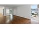 Spacious living room with hardwood floors and access to a private patio at 3242 Henderson Mill Rd # 3, Atlanta, GA 30341