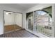 View from patio showcasing access to a private balcony and wooded area at 3242 Henderson Mill Rd # 3, Atlanta, GA 30341