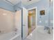 Bathroom with a tub and shower and access to bedroom at 1925 Annwicks Dr, Marietta, GA 30062