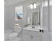 Simple bathroom with white vanity, single sink, and a bathtub at 2124 Berryhill Se Cir, Smyrna, GA 30082