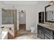 Bathroom with a large walk-in shower, soaking tub, and double vanity at 2124 Berryhill Se Cir, Smyrna, GA 30082