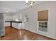 Bright breakfast nook with hardwood floors and window at 2124 Berryhill Se Cir, Smyrna, GA 30082