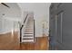 Inviting entryway with hardwood floors and staircase at 2124 Berryhill Se Cir, Smyrna, GA 30082