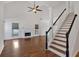 Spacious living room with hardwood floors and fireplace at 2124 Berryhill Se Cir, Smyrna, GA 30082