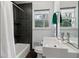 Modern bathroom with dark tile and a white sink vanity at 2481 Brookdale Dr, Atlanta, GA 30345