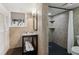 Basement bathroom features a stainless steel sink and shower at 2481 Brookdale Dr, Atlanta, GA 30345